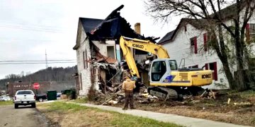 The original goal was to tear down 110 blighted houses and they were actually able to remove 115.