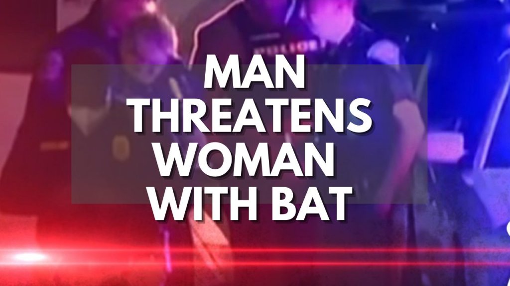 Man Threatens Woman With Bat