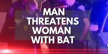 Man Threatens Woman With Bat