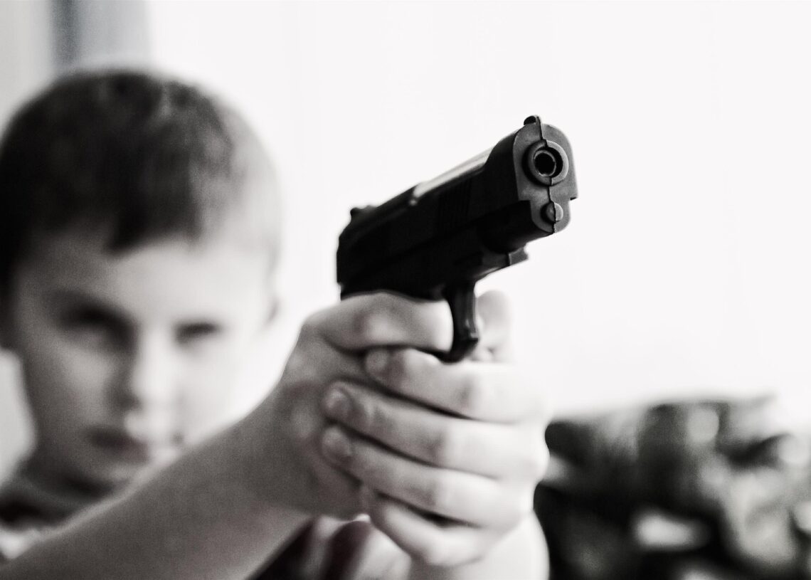 child with gun