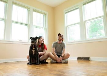 Family sitting in an empty home