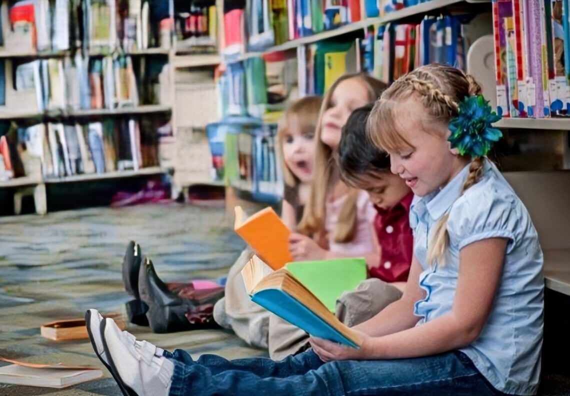 Children Reading Books in the Library