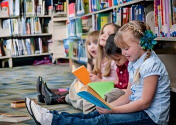 Children Reading Books in the Library