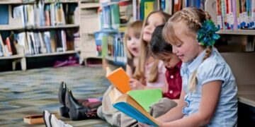 Children Reading Books in the Library