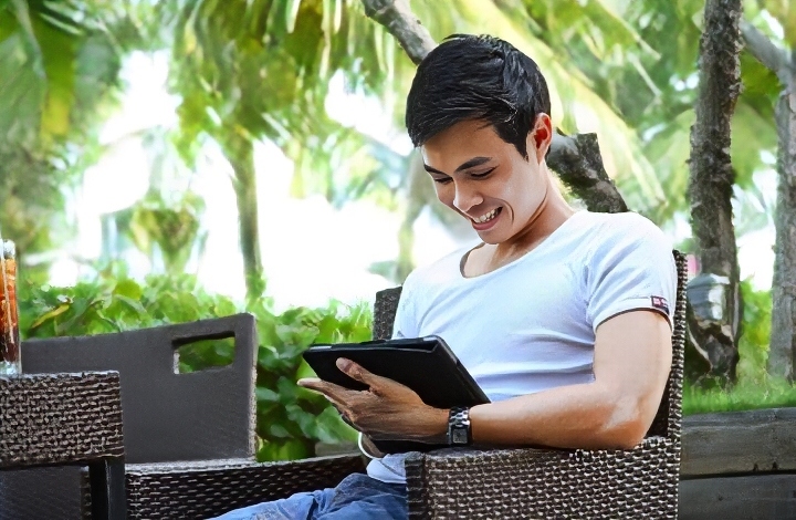 A man holding a tablet