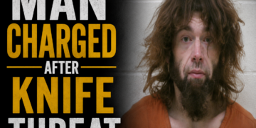 Man arrested after knife threat