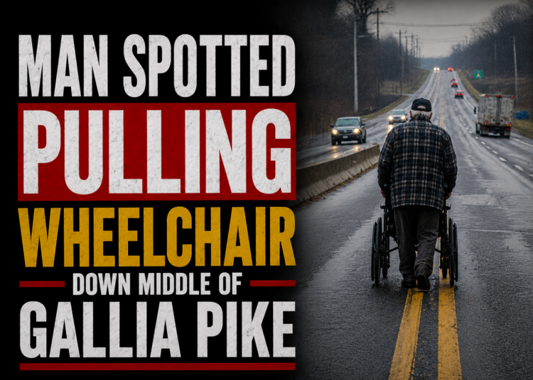 Man pushing wheelchair down gallia pike