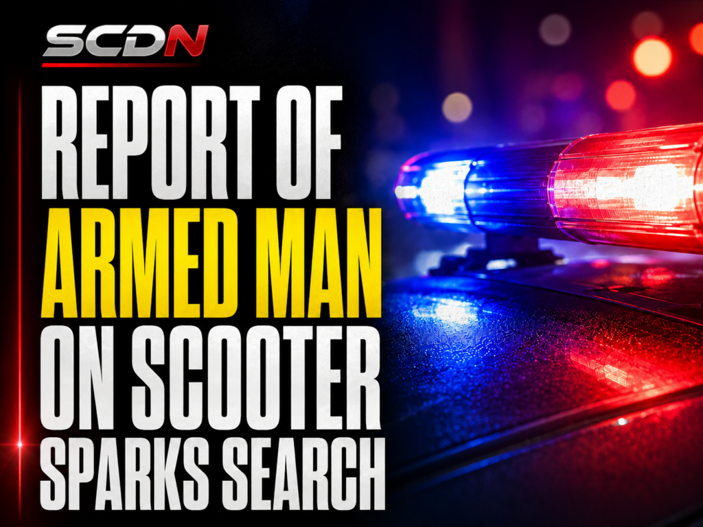 Armed man on scooter