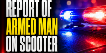 Armed man on scooter