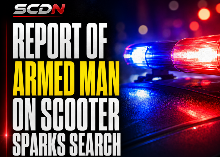 Armed man on scooter