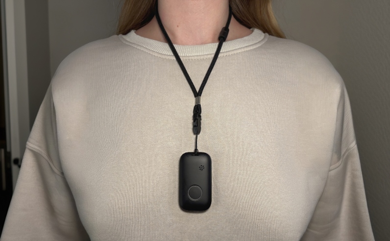 A wearable medical alert pendant for a senior at home