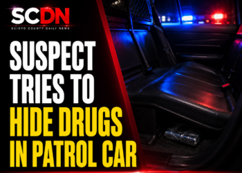suspect hides drugs in patrol car