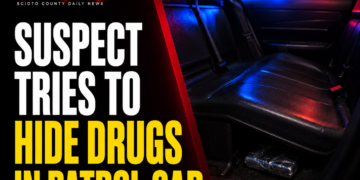 suspect hides drugs in patrol car