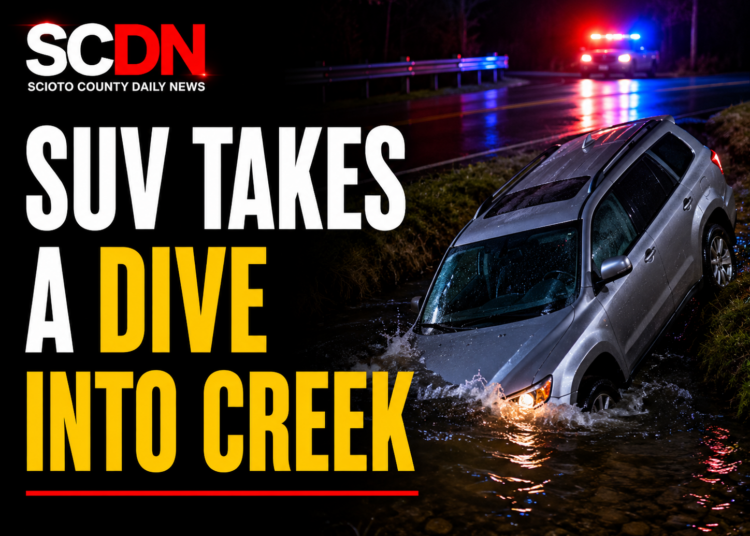 SUV takes dive into creek