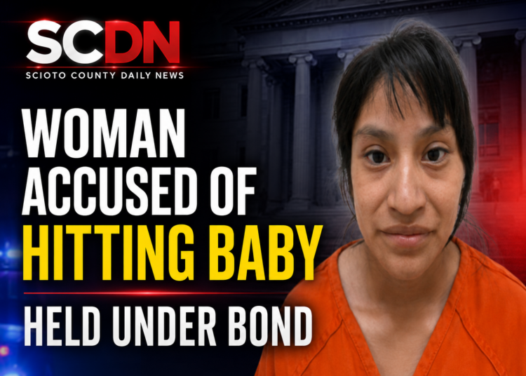 Mom accused of hitting baby