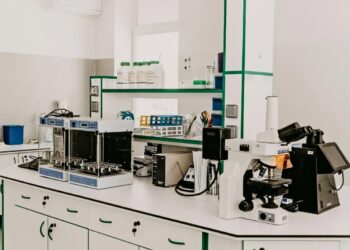 cannabis A laboratory workbench with a microscope and analytical equipment in a bright room