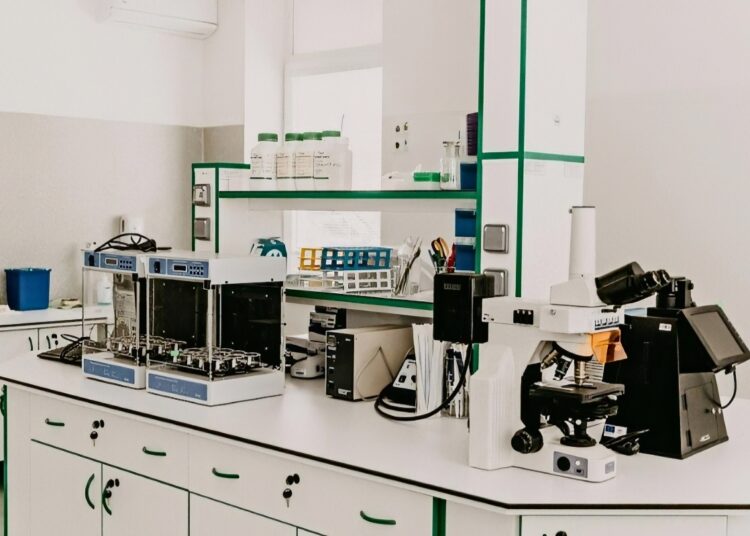 cannabis A laboratory workbench with a microscope and analytical equipment in a bright room