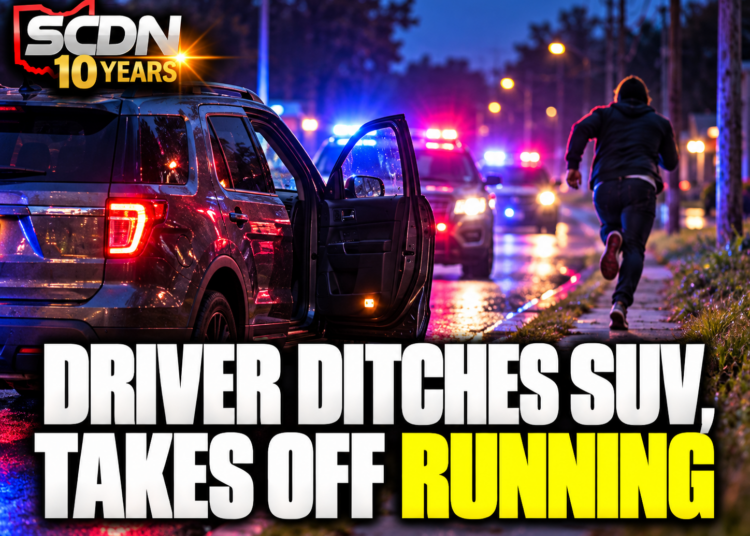 Driver ditches SUV and takes off running.